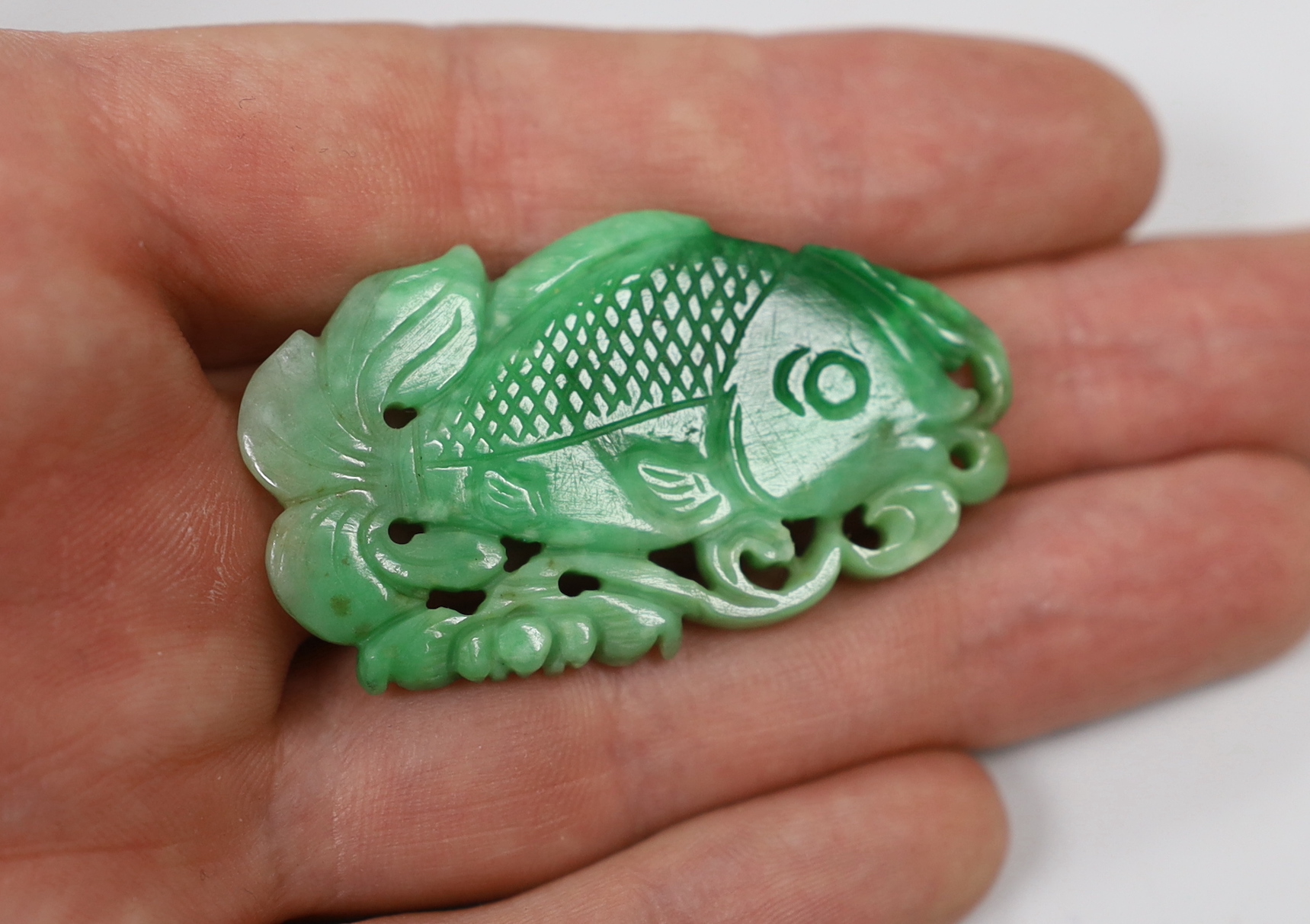 Two jadeite carvings, fish and fruit